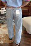 High Rise Twisted Barrel Jeans